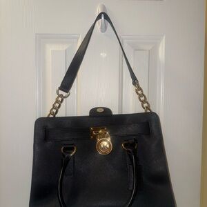 Black Leather Handbag with Gold Accents